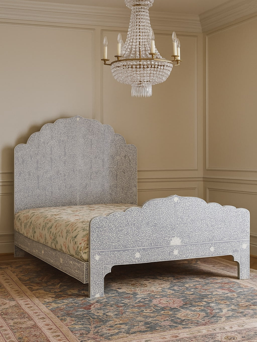 Decorative bone inlay bed with intricate design in a room with a chandelier.