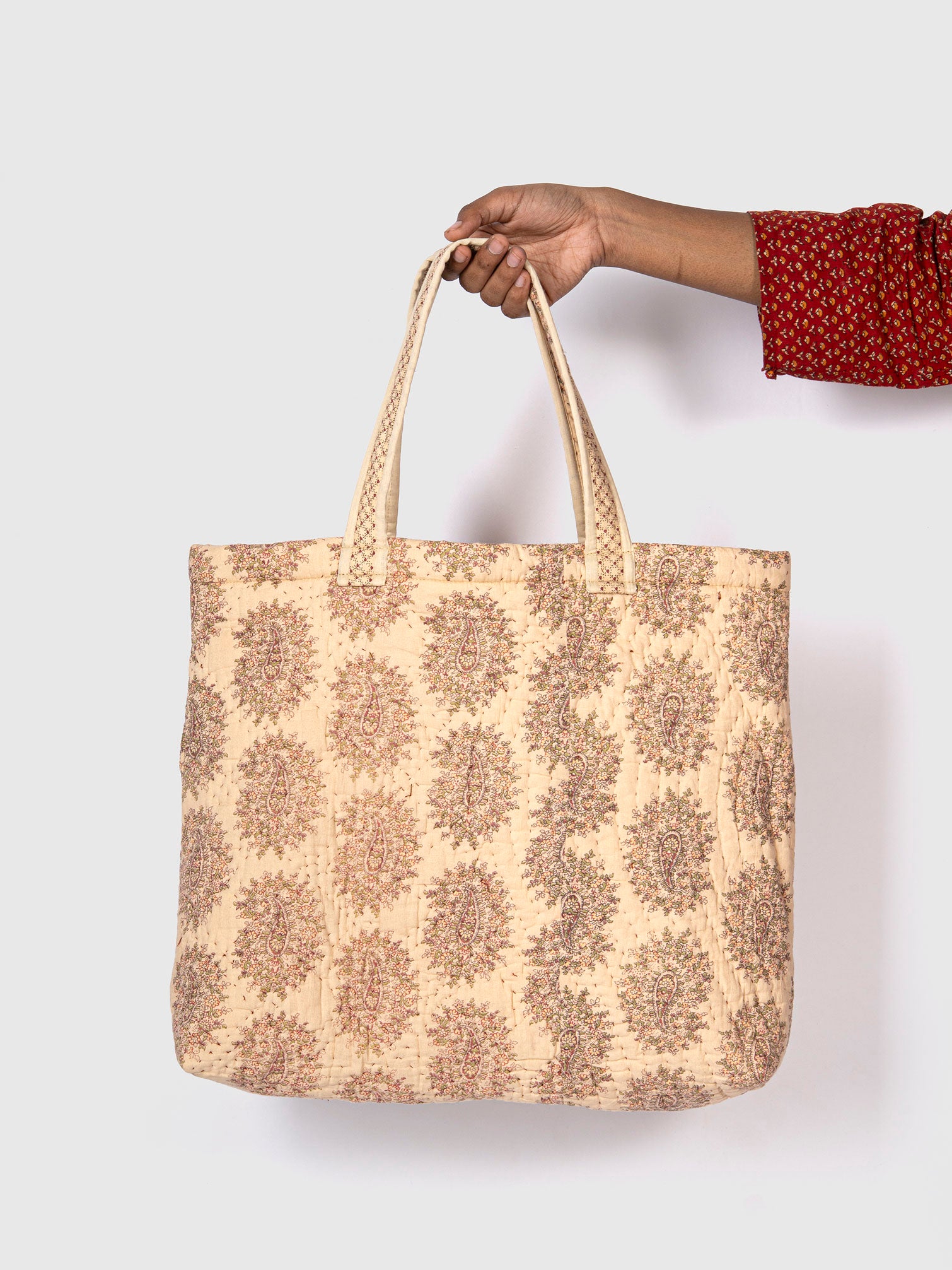 Beige tote bag with floral pattern