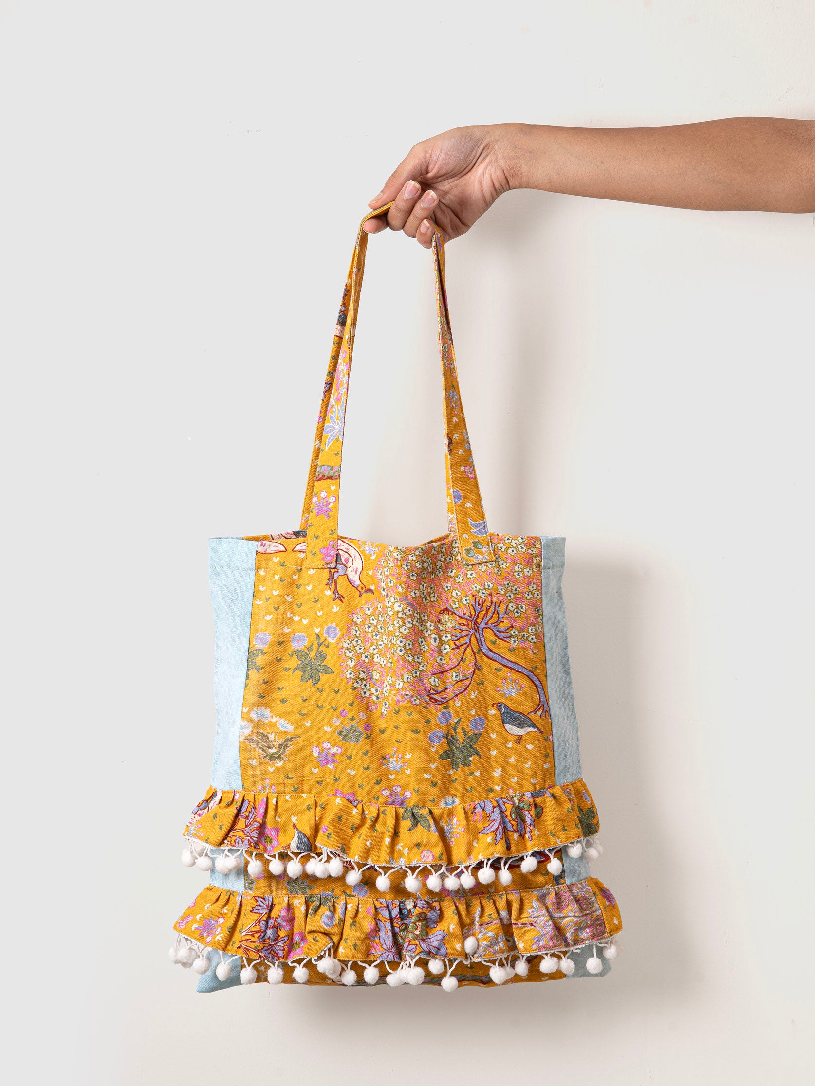 Yellow floral tote bag with ruffles